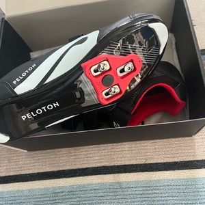 New in box men’s size 46 Peloton